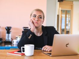 thinking woman at office