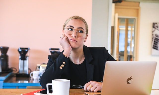 thinking woman at office